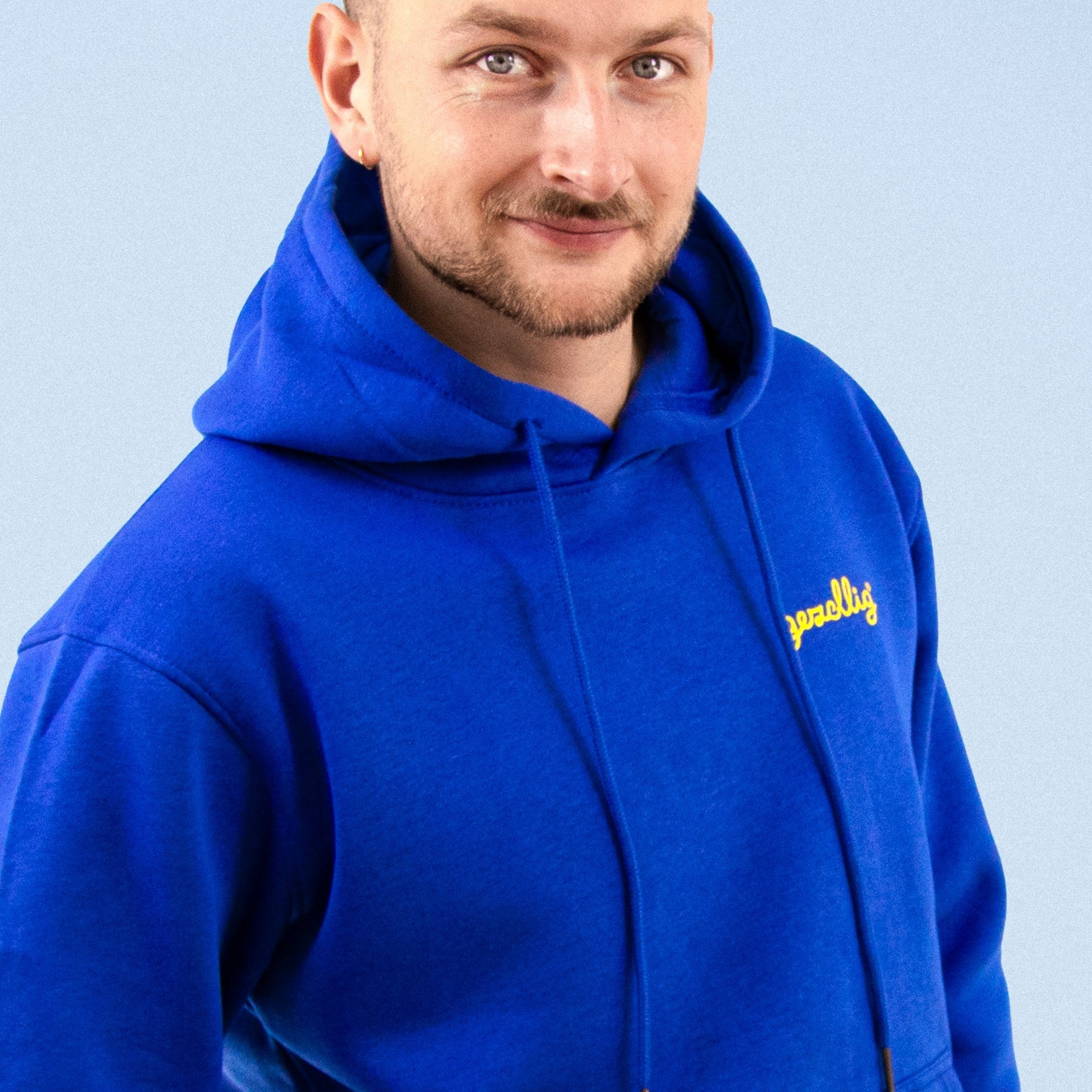 Blue Hoodie with Small GEZELLIG Logo in Yellow Print