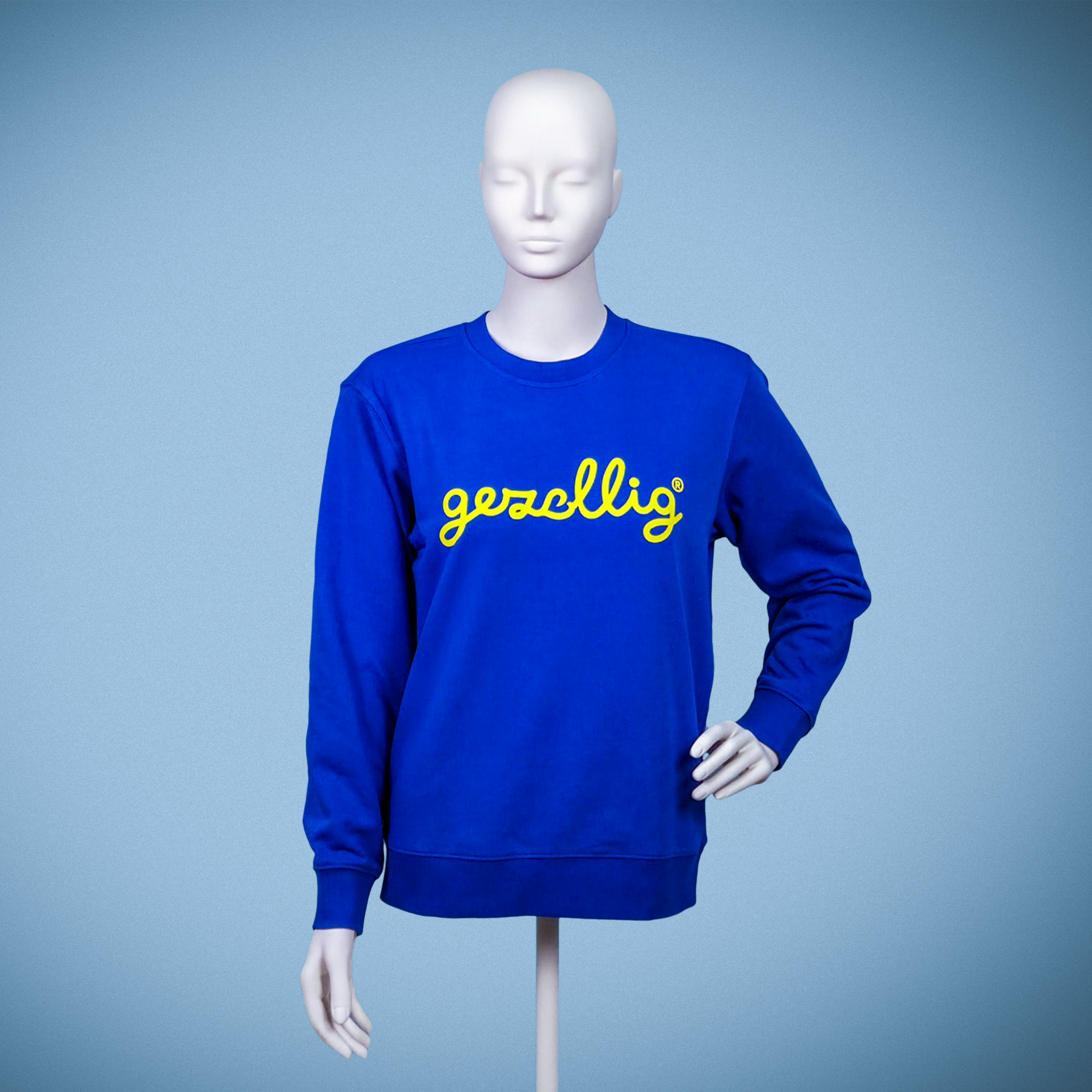 Blue sweatshirt with yellow Gezellig logo

