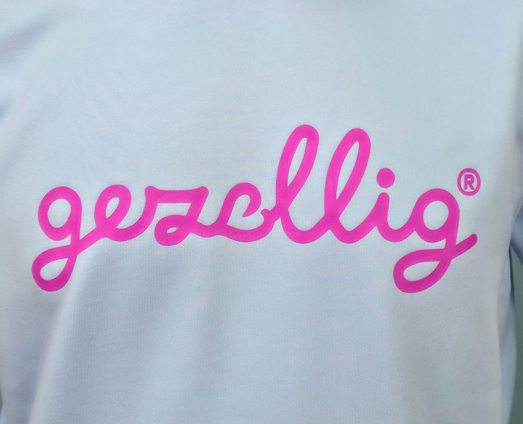 GEZELLIG in Fuchsia on Light Blue Sweater 
