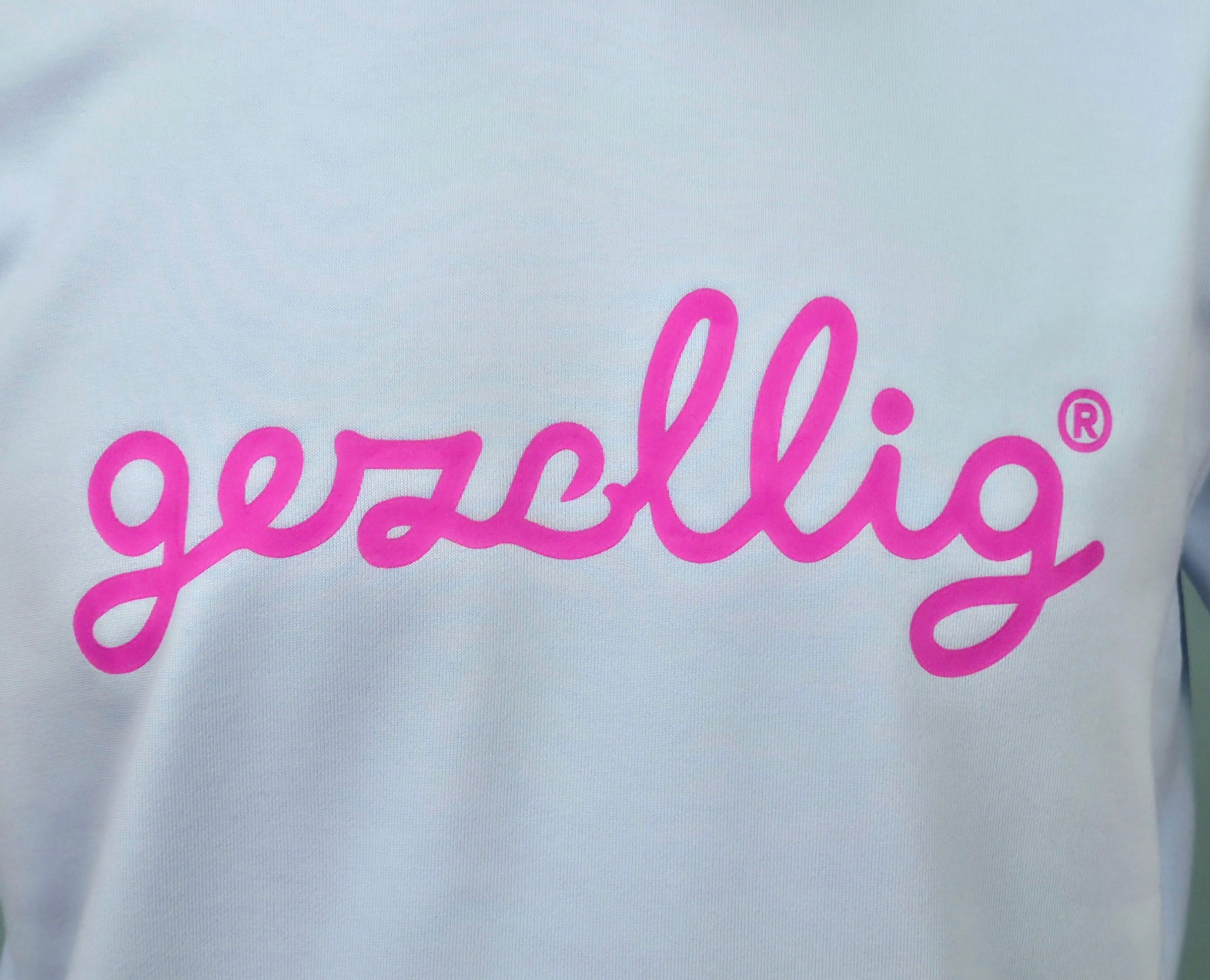 GEZELLIG in Fuchsia on Light Blue Sweater 
