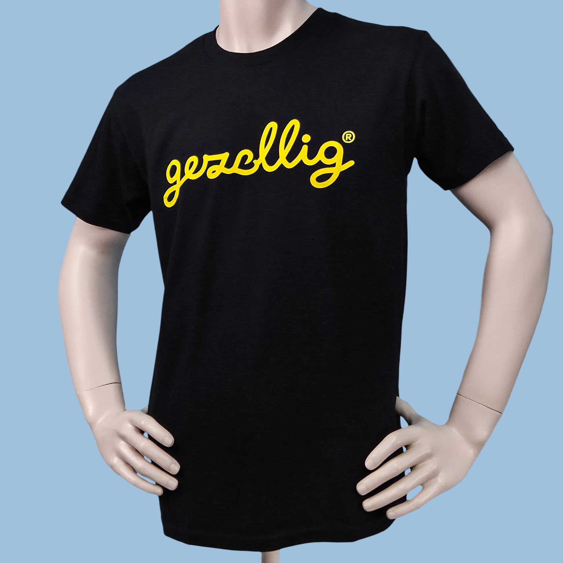 Black t-shirt with yellow Gezellig logo 

