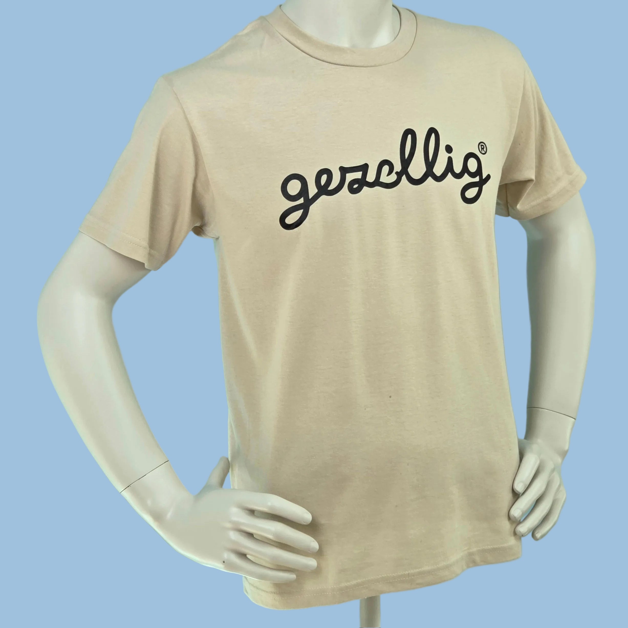 Tan t-shirt featuring a 'gezellig' logo in black
