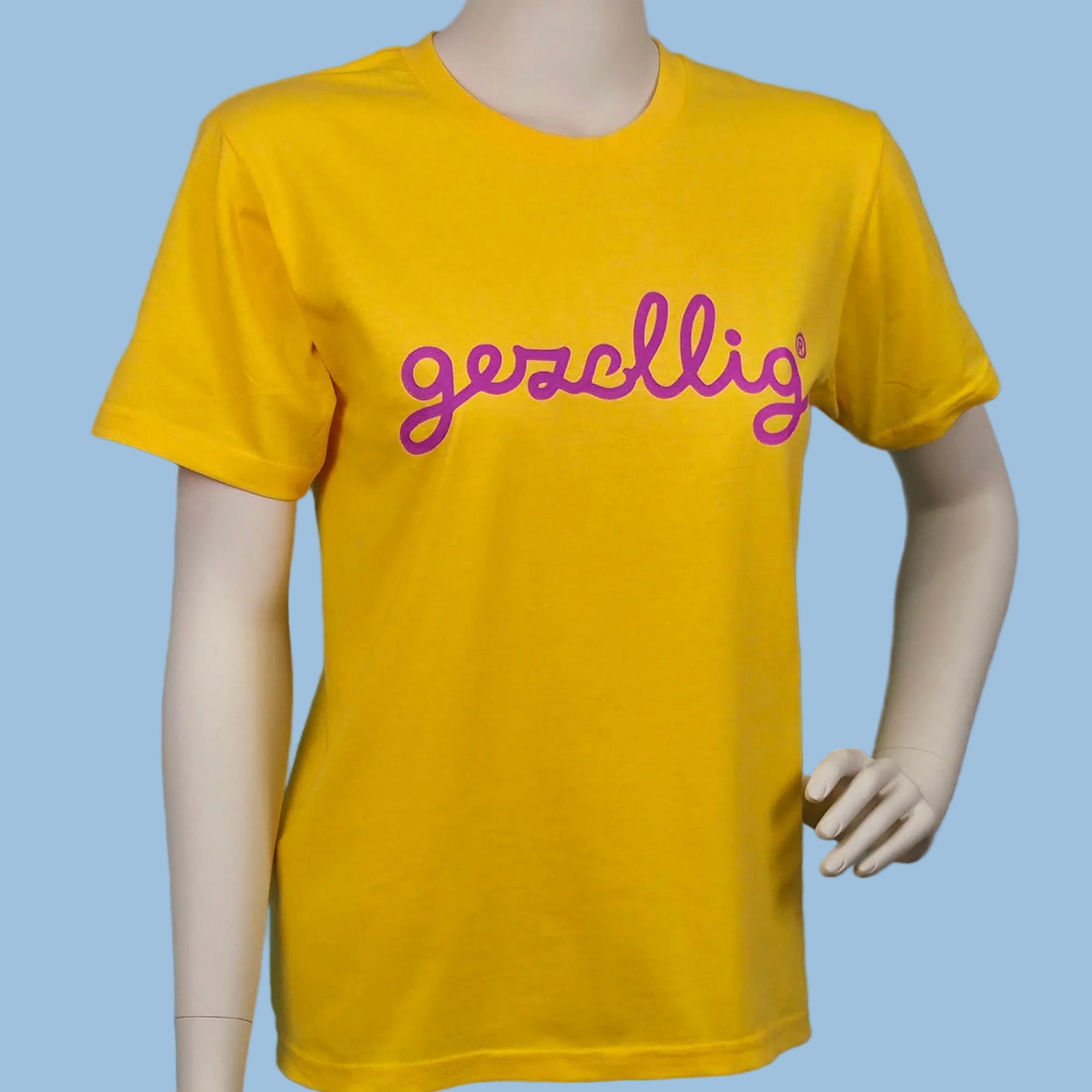 Yellow t-shirt with fuchsia GEZELLLIG logo

