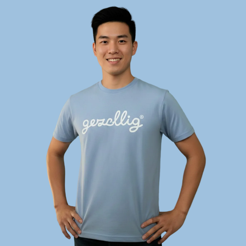 Person wearing a light blue t-shirt with 'gezellig' logo on a plain background

